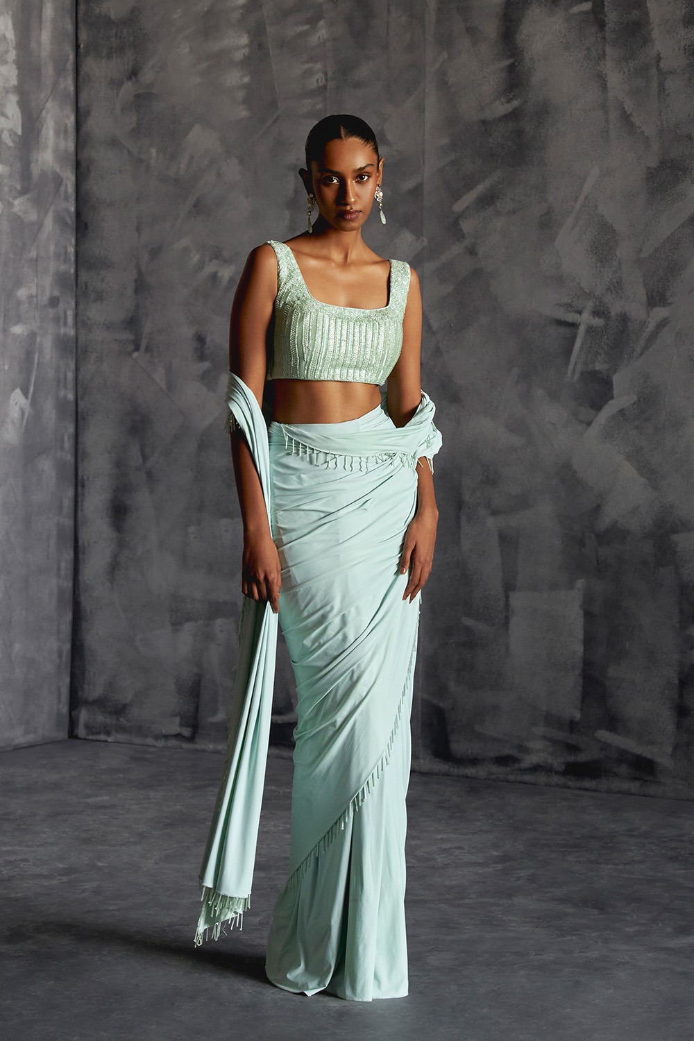 Fitted Draped Saree With Sleeveless Blouse