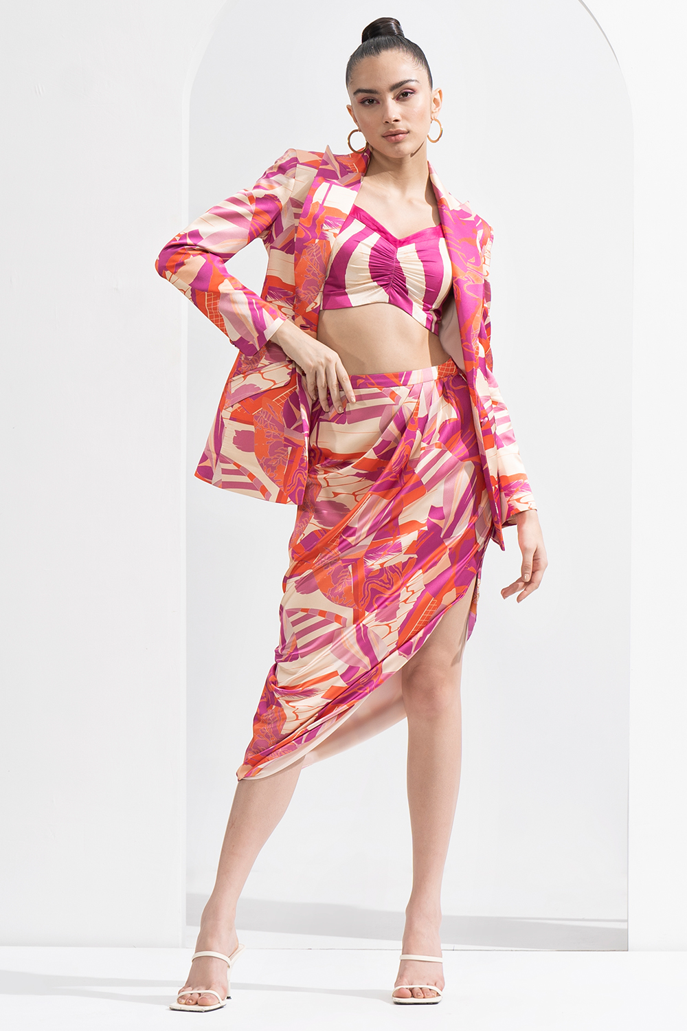 Fuschia Abstract Printed Blazer & Fuschia Waves Printed Bustier With Drapped Skirt 