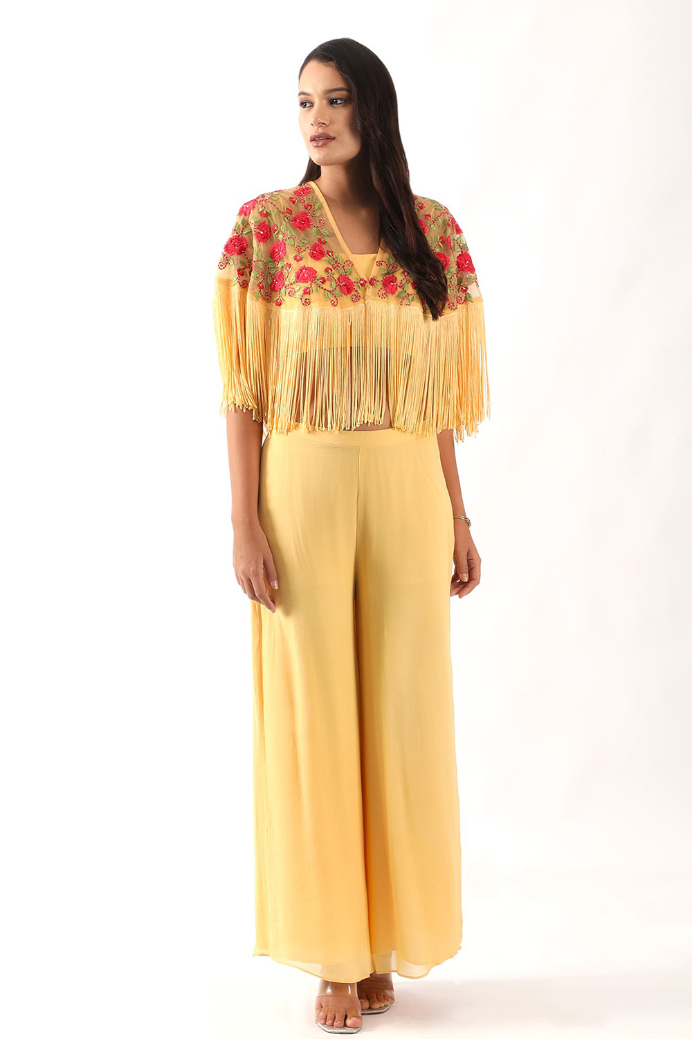 Yellow embroidered fringed cape with blouse and flaired pants