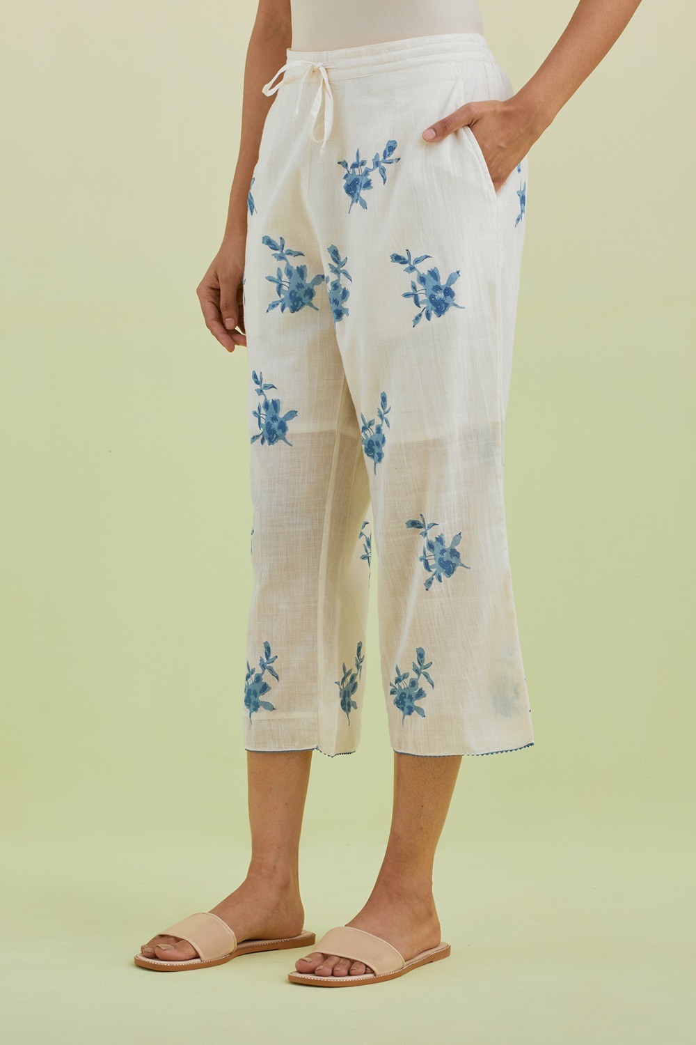 Off White Straight Ankle Length Pants With All-Over Blue Colored Floral Boota Hand-Block Print