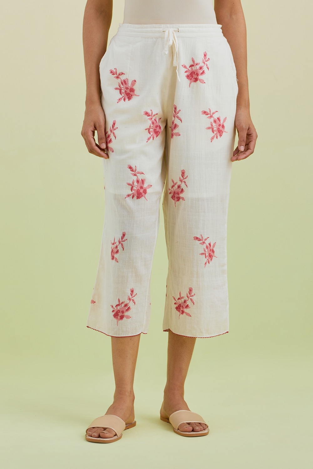 Off White Straight Ankle Length Pants With All-Over Pink Colored Floral Boota Hand-Block Print