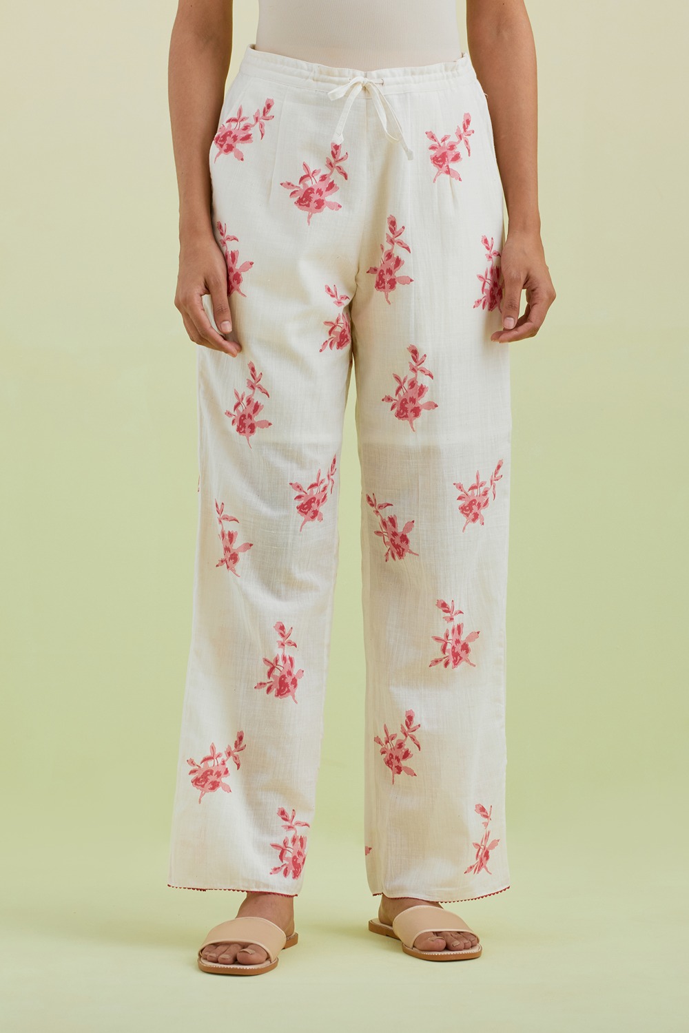 Off White Straight Pants With All-Over Pink Colored Floral Boota Hand-Block Print