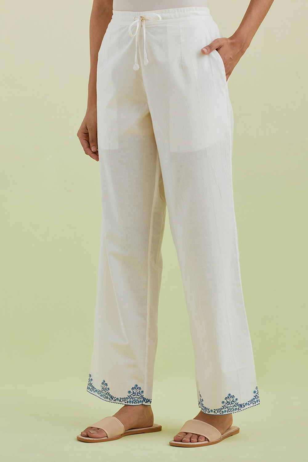 Off White Straight Pants With Blue Colored Hand-Block Printed Border At Hem