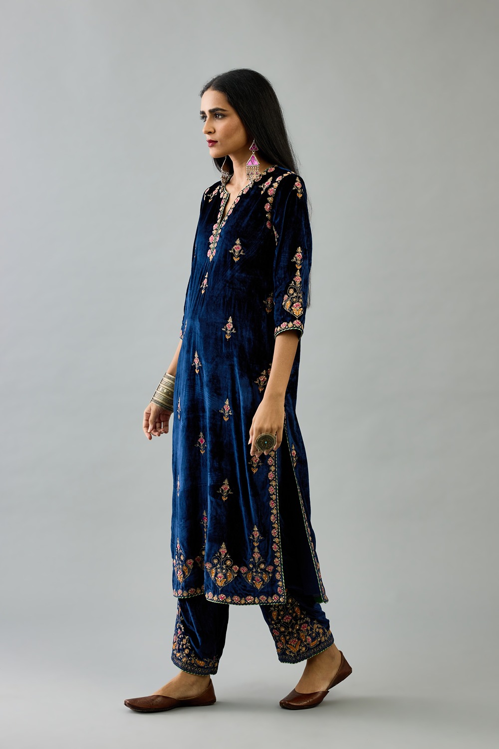 Blue silk velvet straight kurta paired with blue silk velvet straight pants