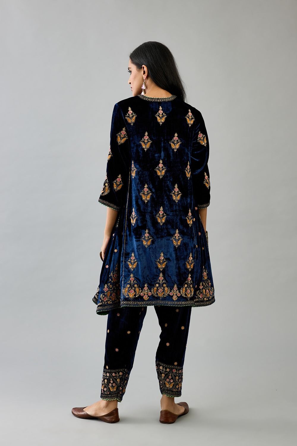 Blue silk velvet A-line short kurta paired with blue silk vilvet salwar